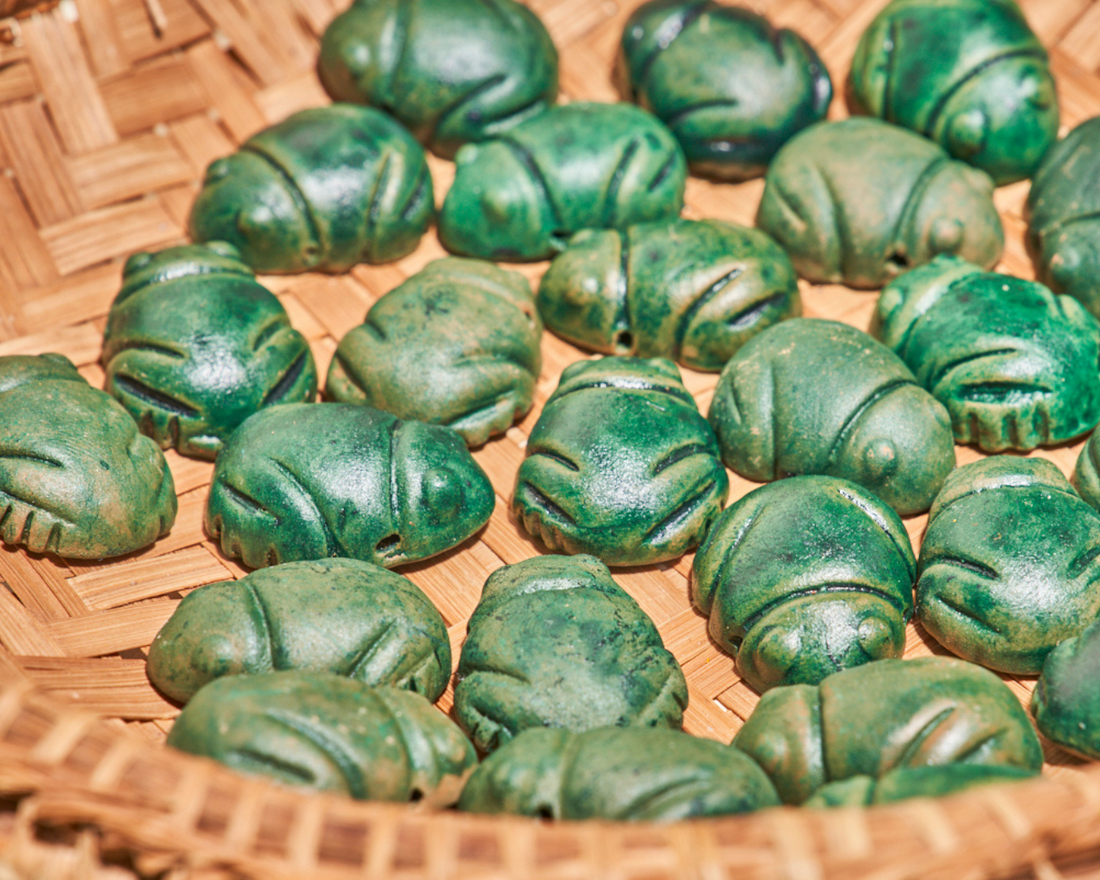 Muiraquitã: o amuleto ancestral que vive na embalagem do Creme Firmador Empina bumbum