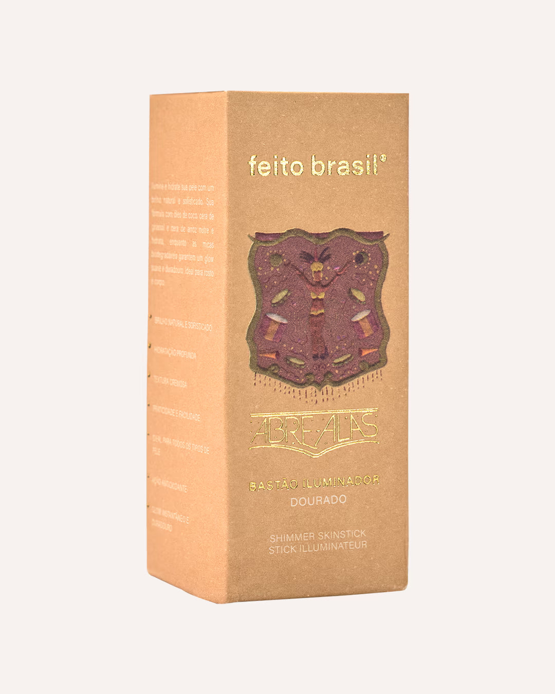 Iluminador facial e corporal vegano em bastão na cor dourada para um brilho radiante e natural aplicado na pele negra inspirado no carnaval brasileiro